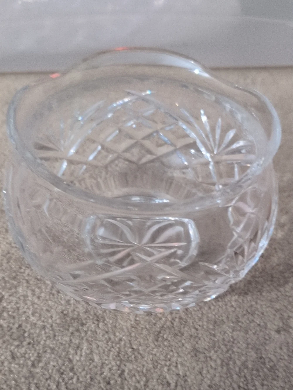 vintage cut crystal rose bowl featuring a diamond and fan pattern.